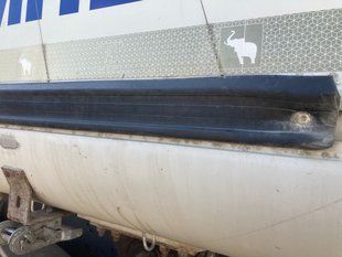Профіль бічного захисту причепа гумовий SCHMITZ 1023691 10500 мм T10343 фото